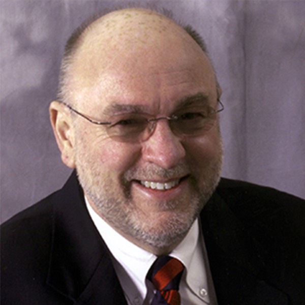 Dr. Tim Lautzenheiser
